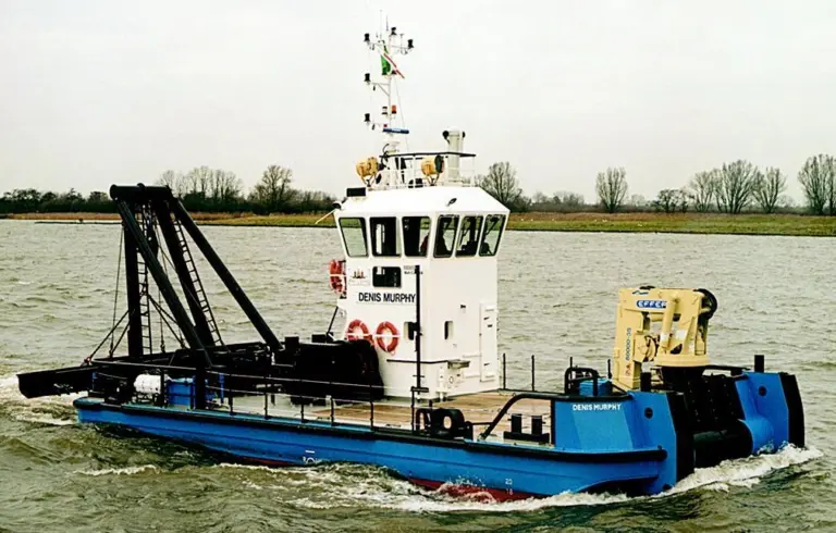 DENIS MURPHY is typical of many multi-purpose pontoon style work vessels in service around the world