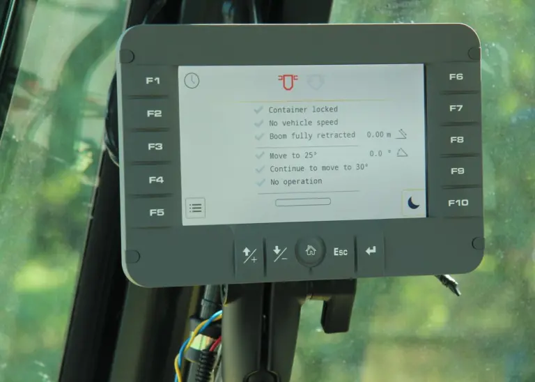 At the touch of a button the operator sets into action a pre-programmed lift cycle which weighs the container