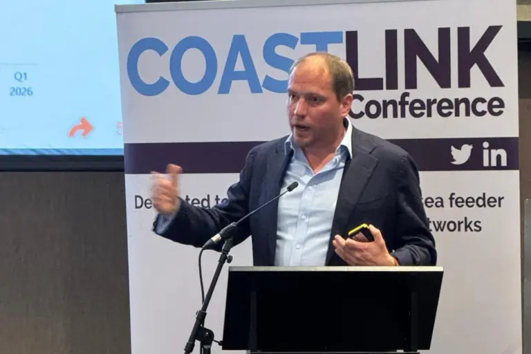 Johan-Paul Verschuure, maritime entrepreneur and director/partner, Rebel Ports and Logistics on the podium at Coastlink