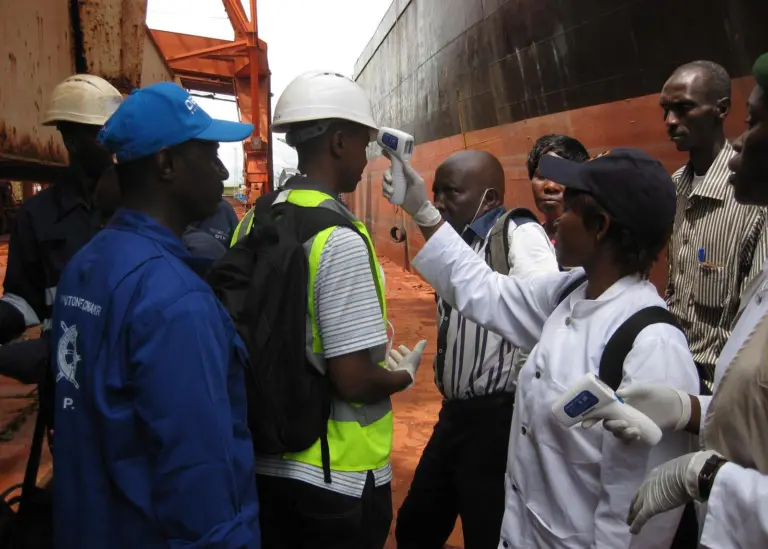 Hot head: some ports are checking the temperatures of crews on arrival. Credit: CDC Global/Emily Jentes