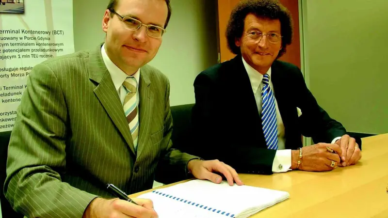 Adam Kaliszewski, BCTs financial director and Tom Falknor, president of BCT and senior v-p, ICSTI, sign the loan facility