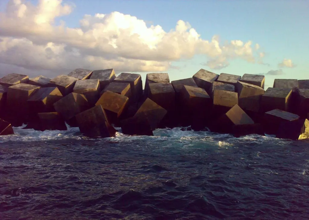 The armour blocks on the breakwater needed careful alignment