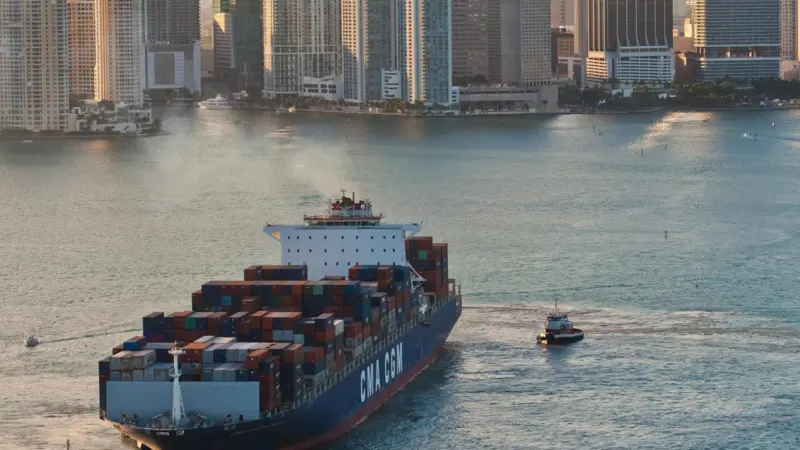 Cargo ship with Miami skyline