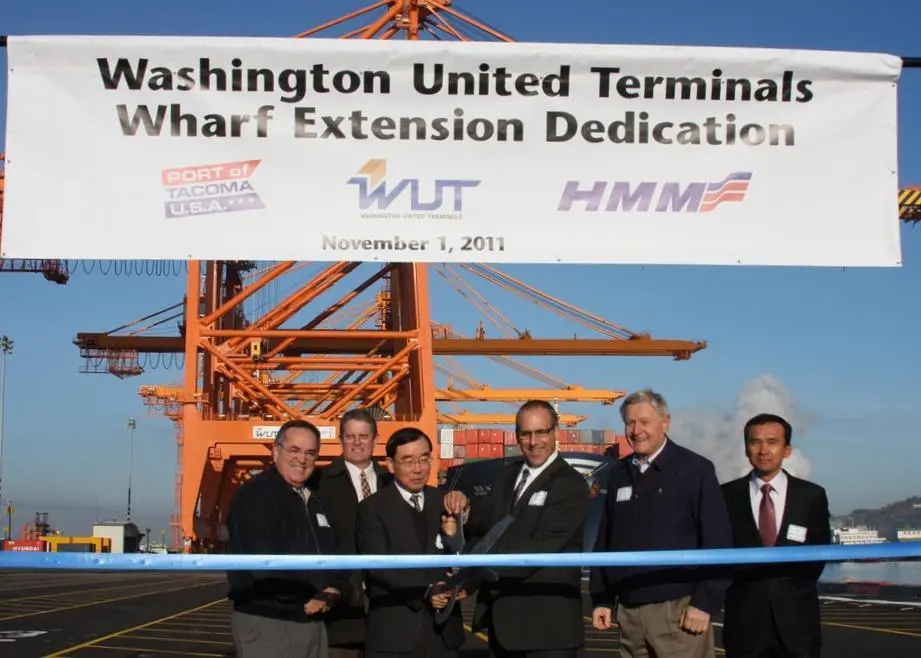 HMM in happier days at the Port of Tacoma; now the operator is looking to sell off terminal investments