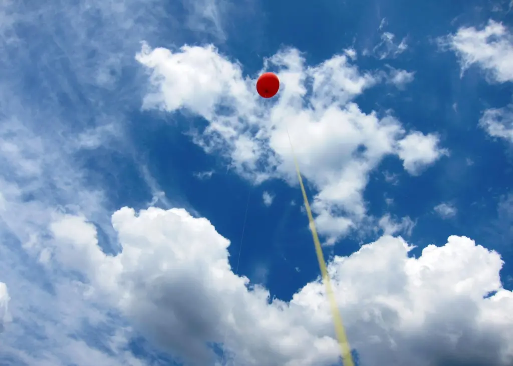 Flying high: a simple, stationary tethered balloon can act as lift infrastructure
