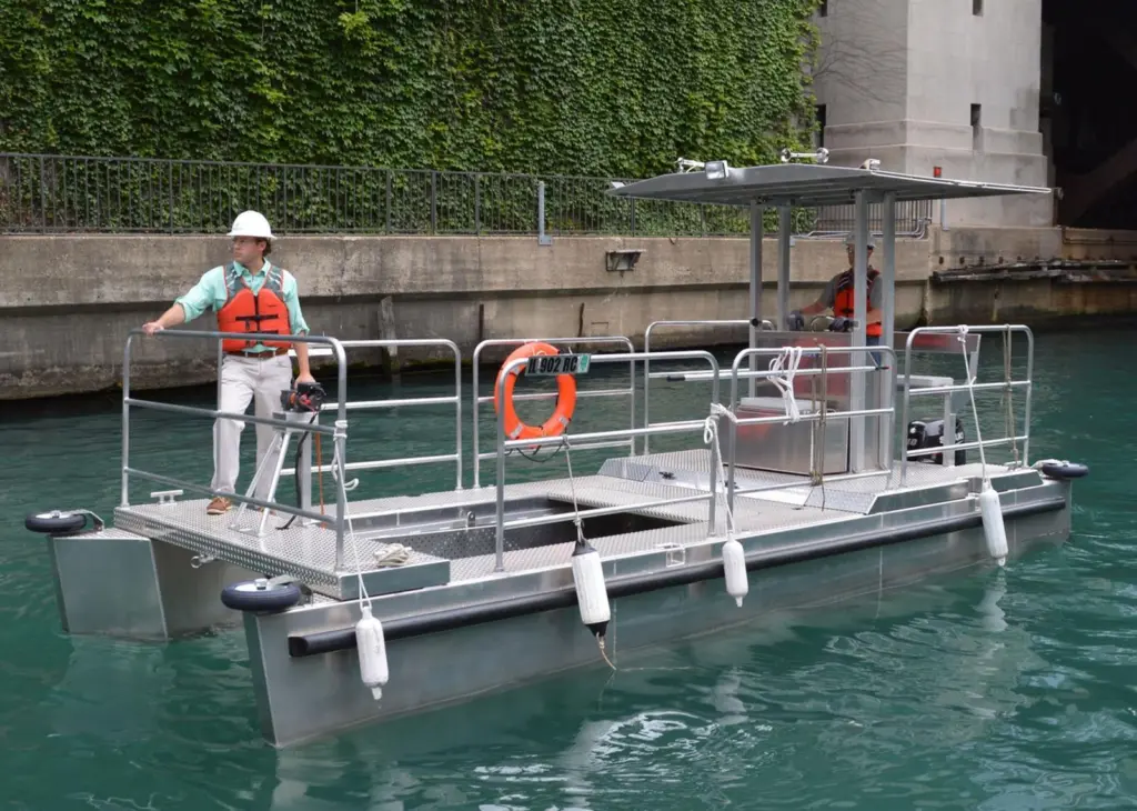 Elastec and MWRD worked together to develop two custom trash and debris collection boats