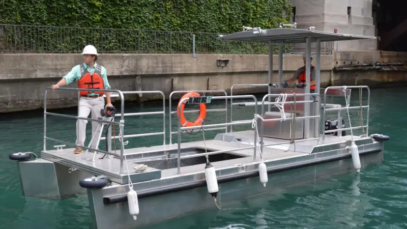 Elastec and MWRD worked together to develop two custom trash and debris collection boats