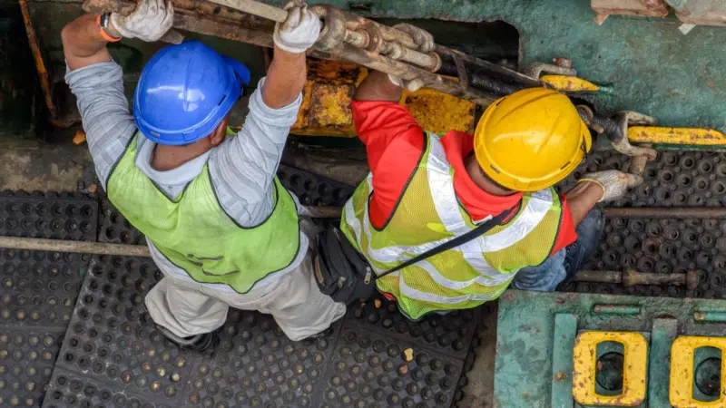 Port operations can be physically and mentally demanding. Credit: 123rf