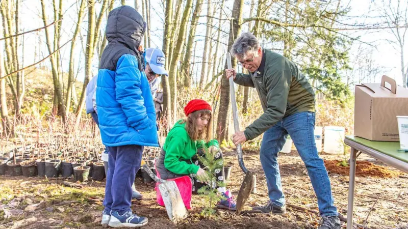 Port of Seattle commissioner Fred Felleman gets stuck in with a community tree planting work party. Credit: Port of Seattle