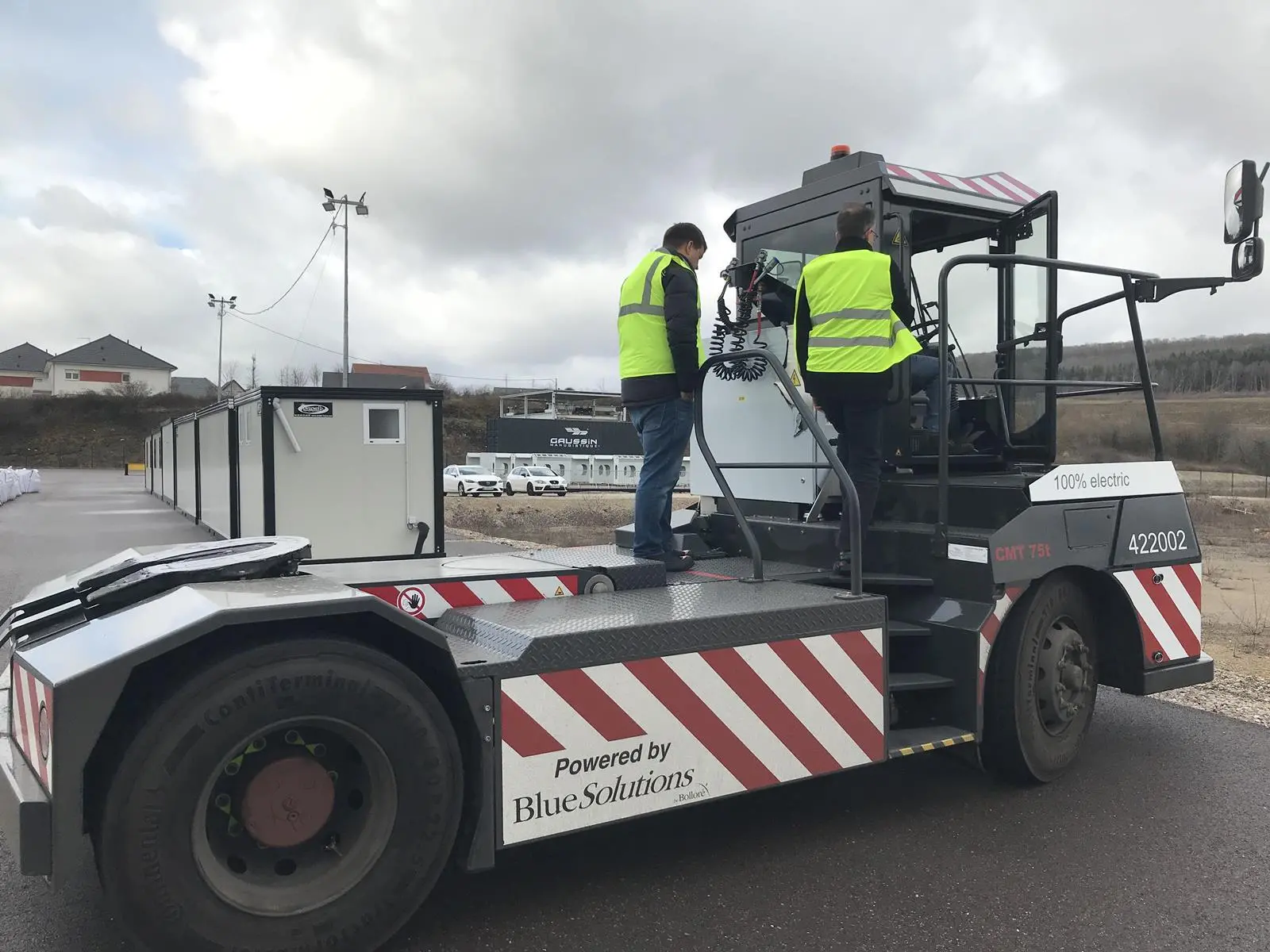 CentrePort staff look over the electric tractor in a visit to Gaussin's plant in northern France.