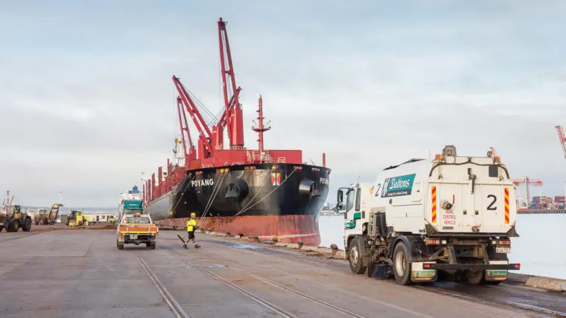 A sweeper truck cleaning the Mount Maunganui wharves at Port of Tauranga