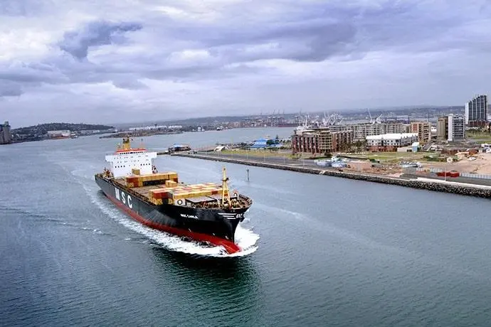 A cargo ship on the water.
