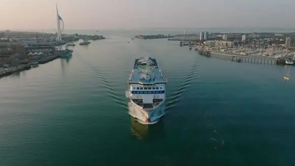 Ship sailing into Portsmouth harbour, UK