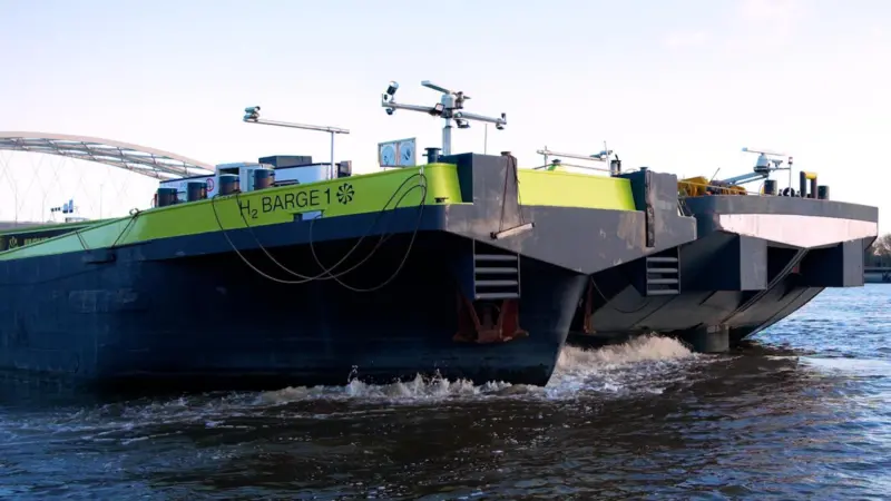 The picture shows H2 Barge 1 in action on the water
