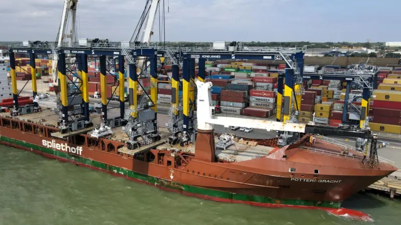 Image shows five new automated electric Rubber-Tyred Gantry cranes have arriving at the Port of Felixstowe by ship