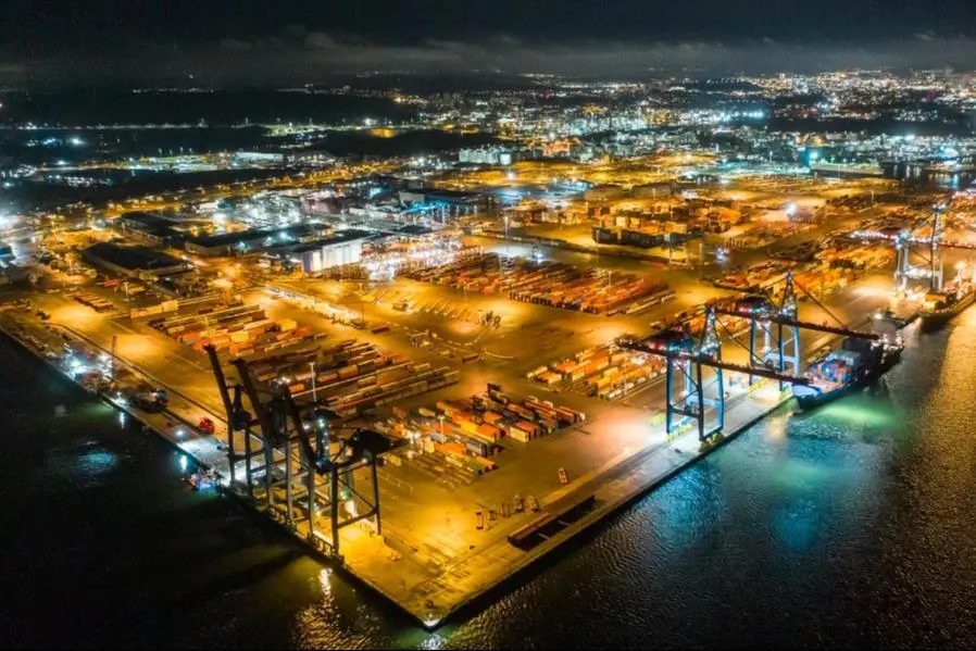 The image shows an overhead shot of Gothenburg container terminal at night