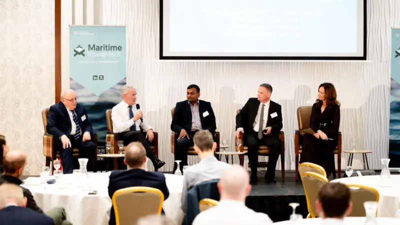 The image shows pannelists in discussion at the Maritime Power-to-X stakeholder event
