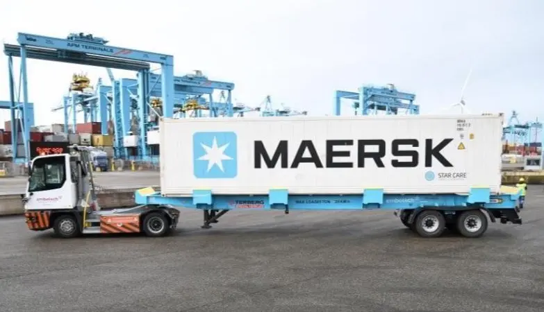 The image shows one of the electric automated terminal trucks (ATTs),