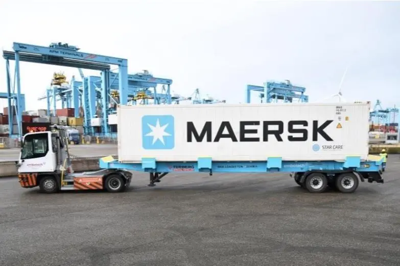 The image shows one of the electric automated terminal trucks (ATTs),