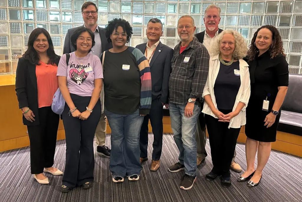 The image shows a shot of Rose Foundation representatives