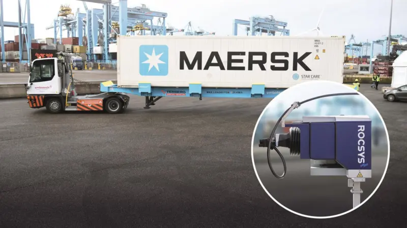 Maersk truck at the APMT Massvlakte II terminal at the Port of Rotterdam with an image of a Rocsys hands-free charging unit