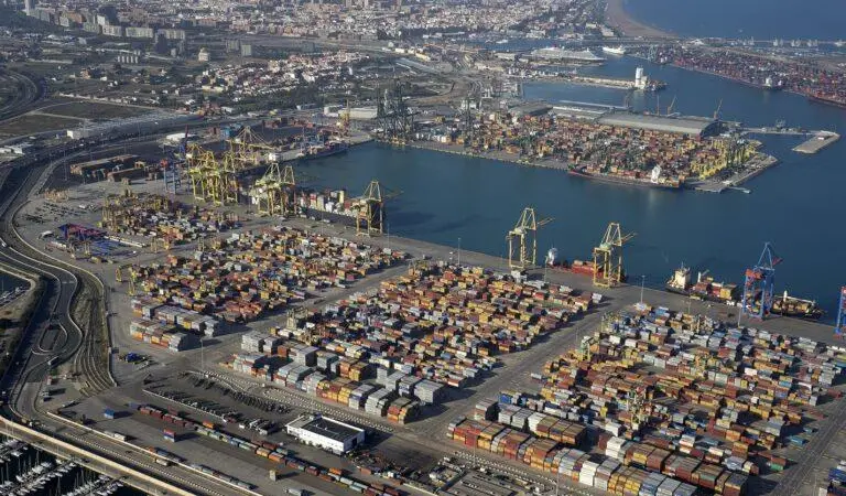 The image shows an overhead shot of Valencia Port