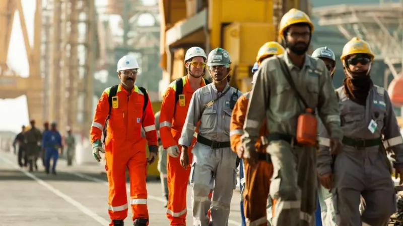 Workers at a port in safety gear