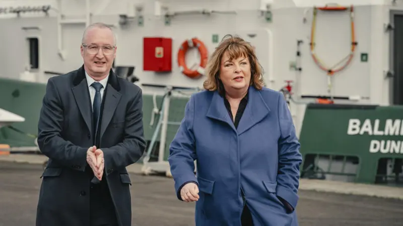 The picture shows Stuart Wallace (CEO Forth Ports) and Fiona Hyslop Cabinet Secretary for Transport
