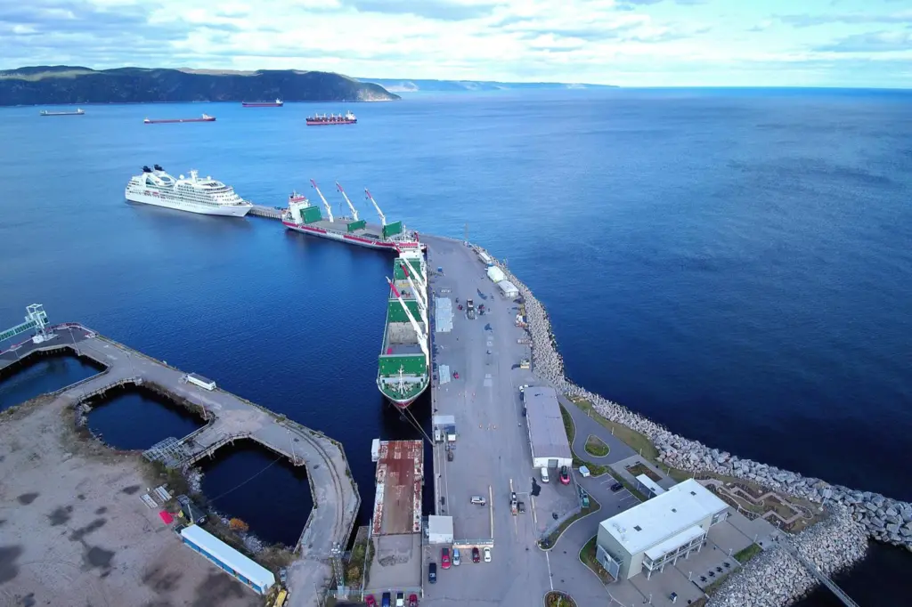 The image shows vessels on the quayside at Baie-Comeau Port
