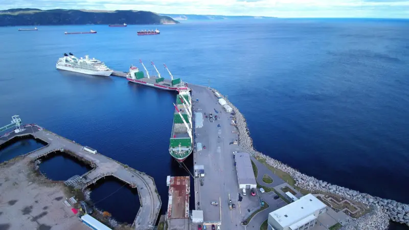The image shows vessels on the quayside at Baie-Comeau Port