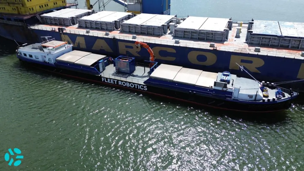 Fleet Robotics ship next to a container ship