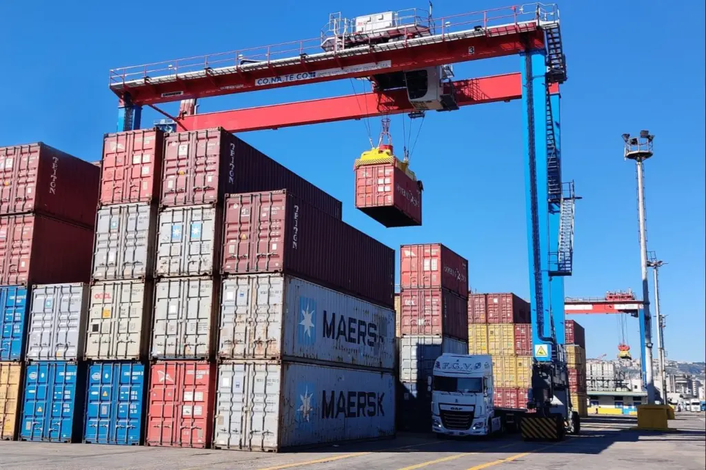 The image shows the Liebherr RTGs in action at Conateco in Italy