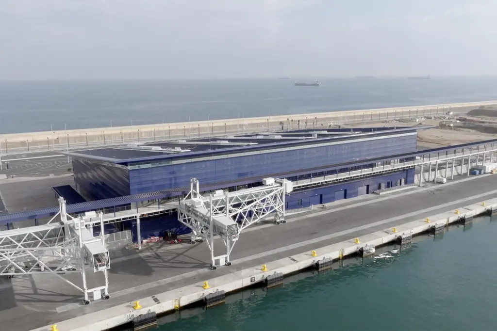 The image shows Barcelona's cruise Terminal H at Adossat Wharf