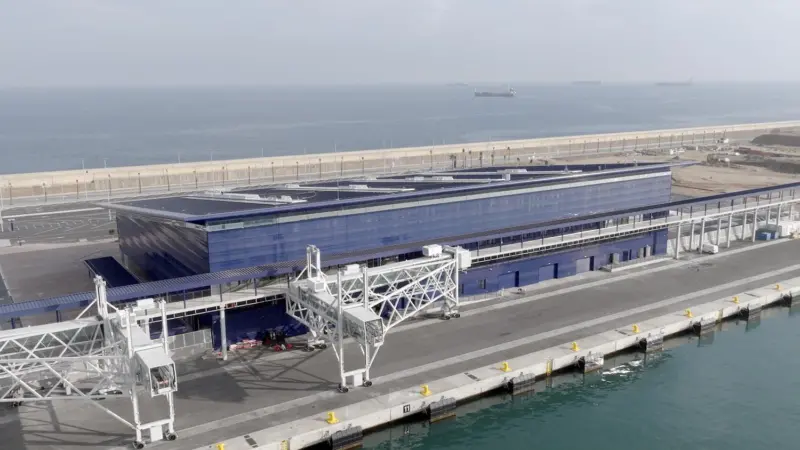 The image shows Barcelona's cruise Terminal H at Adossat Wharf