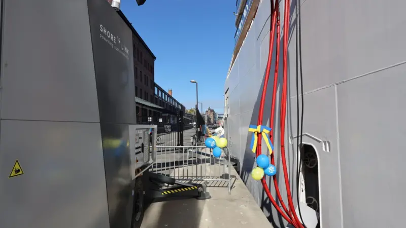 The image shows Viking Jupiter connecting to the new OPS facility on the quayside