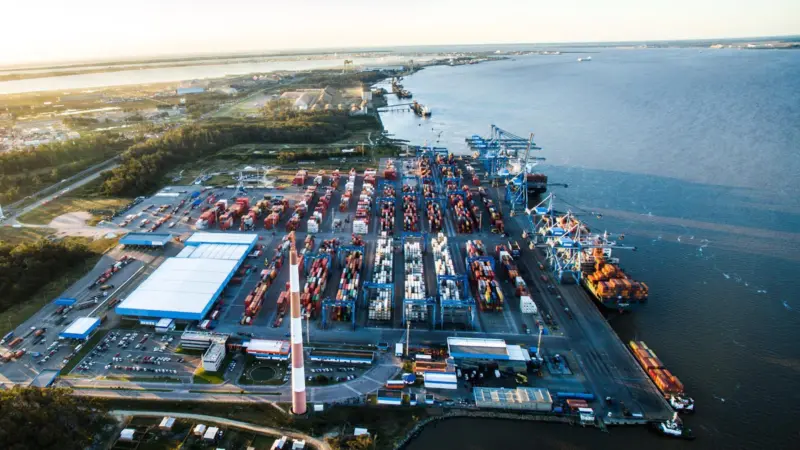 The photo shows an aerial vista of Wilson Sons' Tecon Rio Grande terminal