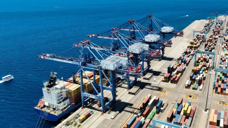 The image shows an aerial shot of Jordan ACT APM Terminals