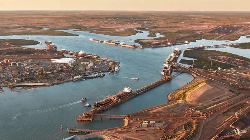 The image shows a overhead shot of the Port of Dampier