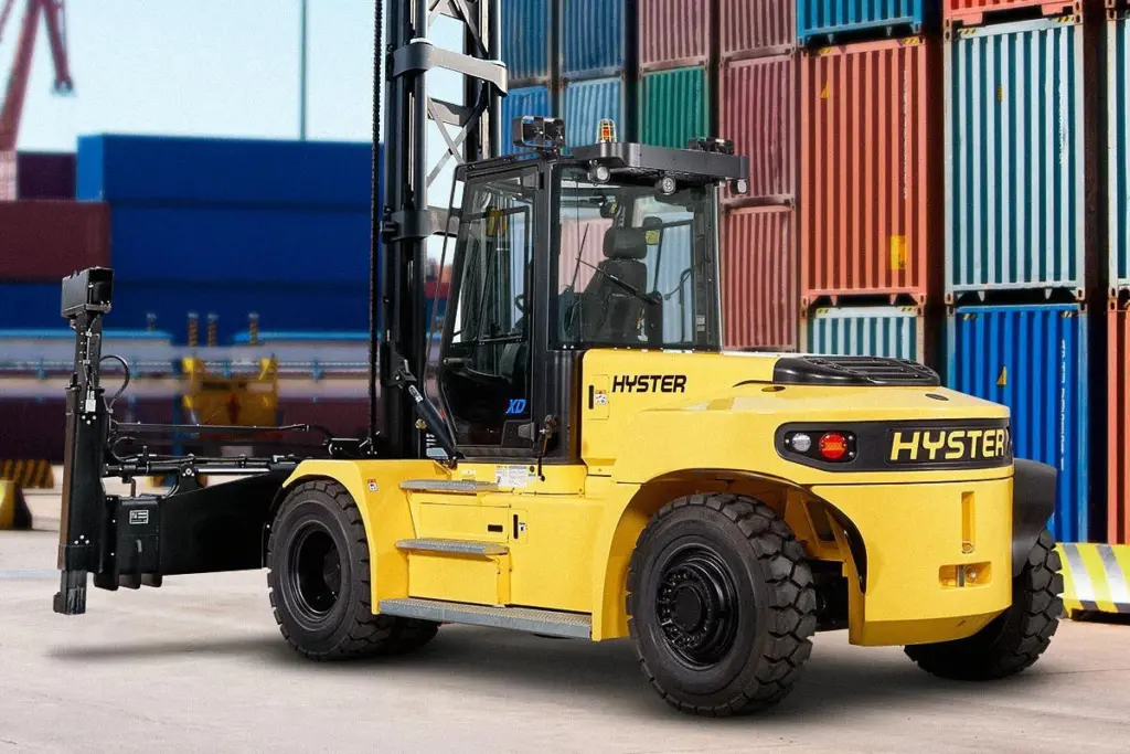 The image shows a Hyster J6-7XD-EC3/4 empty container handler on the quayside