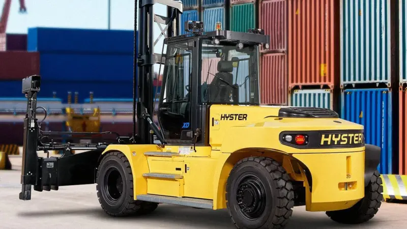 The image shows a Hyster J6-7XD-EC3/4 empty container handler on the quayside