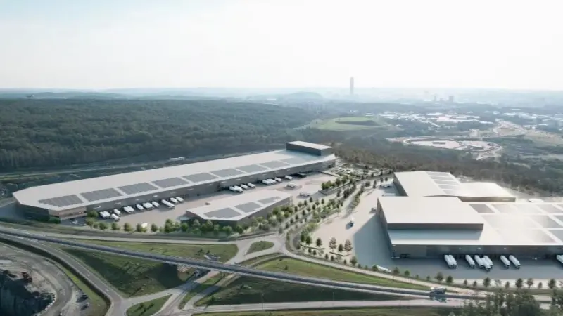 The image shows a conceptual rendering of Halvorsäng Logistics Park