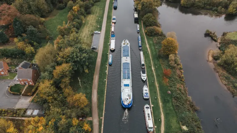 The image is a drone overhead picture of the canal serving Stourton Wharf