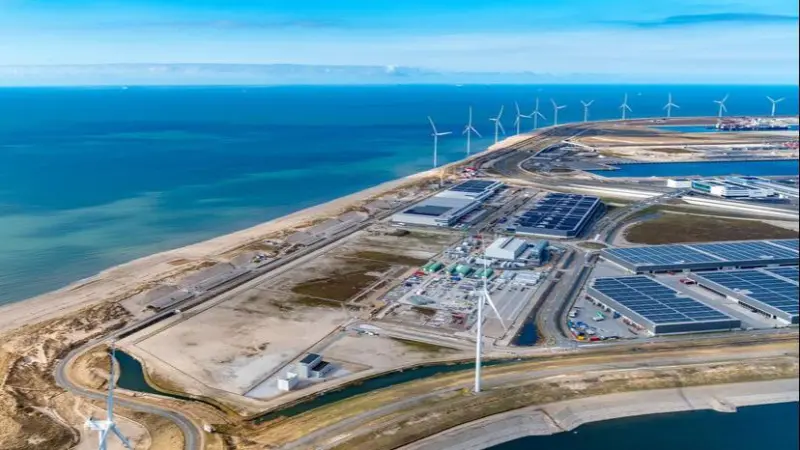 The image shows an aerial shot of the Maasvlakte at the Port of Rotterdam