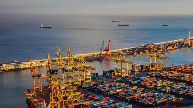 The image is of a aerial shot of a port terminal
