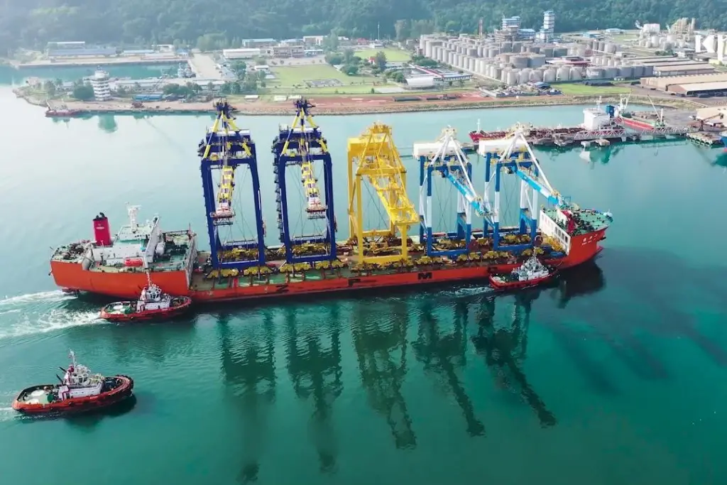 The image shows a vessel on the quayside at Kuantan Port