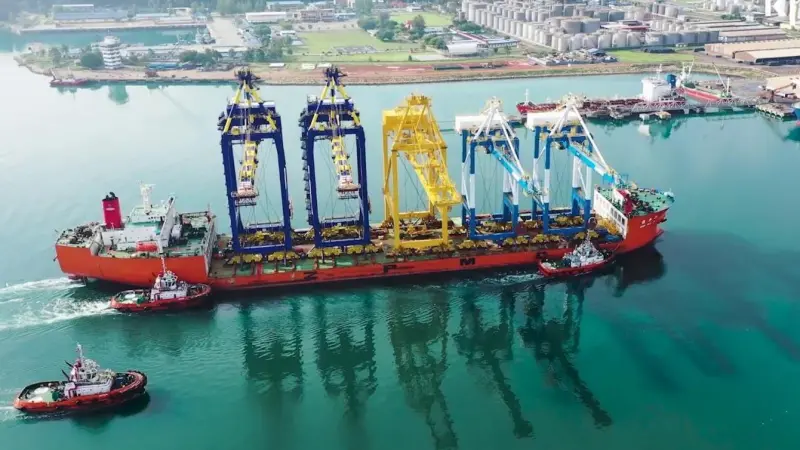 The image shows a vessel on the quayside at Kuantan Port