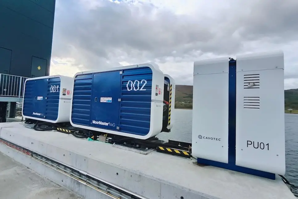 The image shows the Cavotec MoorMaster NxG system on the quayside