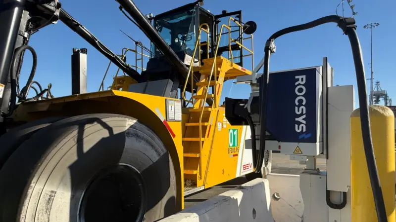 The image shows the Taylor Machine Works container handler on charge at Long Beach
