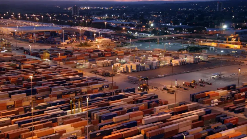 The image shows a night aerial view of container yard at Southampton terminal