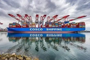 A picture of a COSCO vessel at the Port of Long Beach